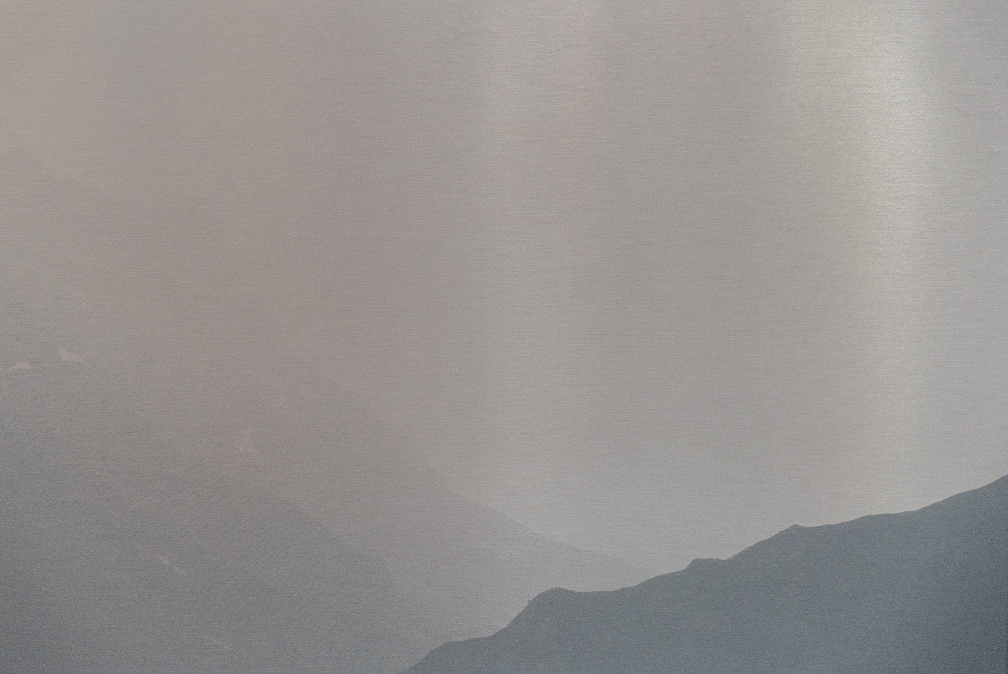 Moody mountain landscape with low visibility